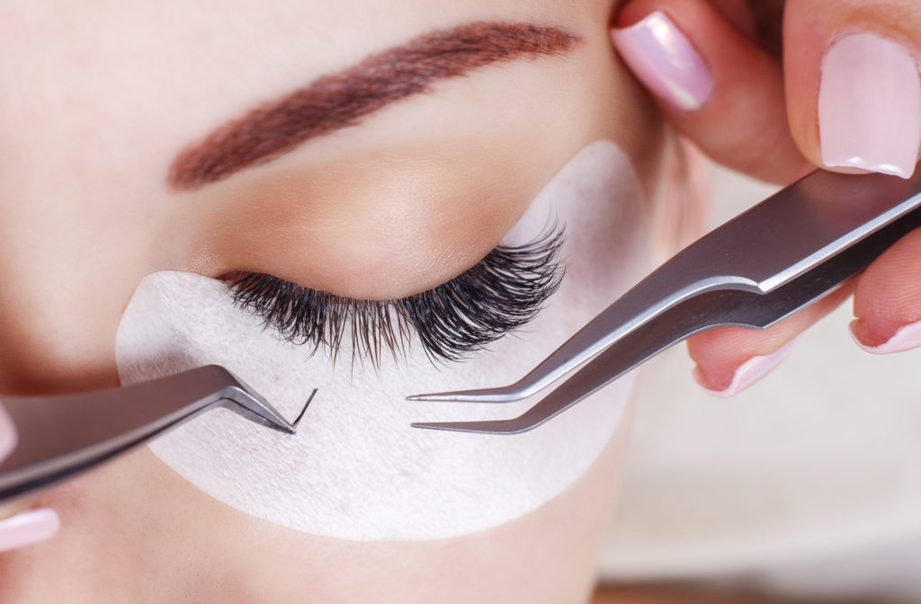 Close up of eyelash extensions procedure
